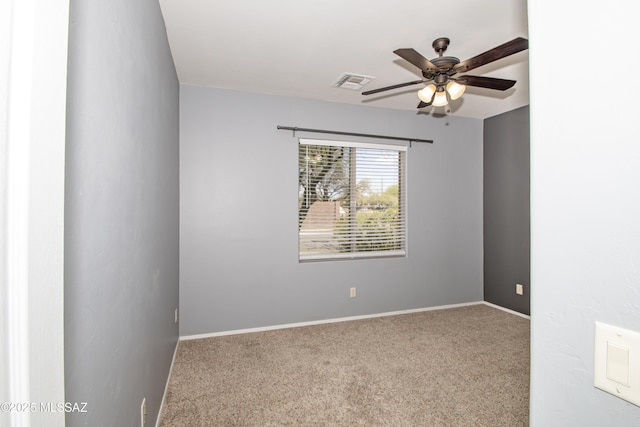 1419 W Red Creek Dr, Tucson, AZ 85737 - carpeted empty room with a ceiling fan and baseboards