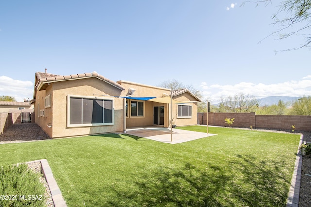 1419 W Red Creek Dr, Tucson, AZ 85737 - back of house with a patio area, a fenced backyard, stucco siding, and a tile roof