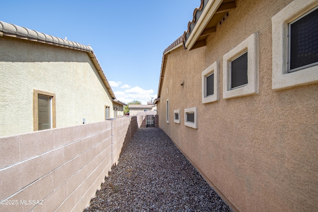 1419 W Red Creek Dr, Tucson, AZ 85737 - view of side of home with stucco siding