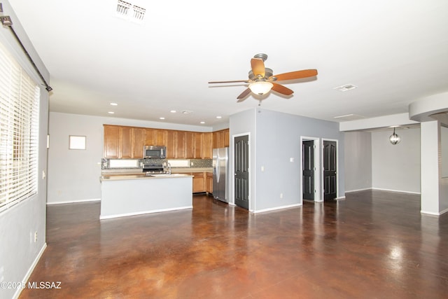 1419 W Red Creek Dr, Tucson, AZ 85737 - unfurnished living room with finished concrete flooring, ceiling fan, and recessed lighting