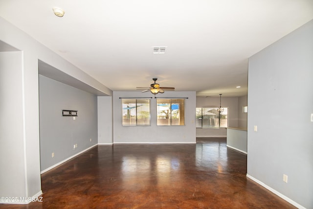 1419 W Red Creek Dr, Tucson, AZ 85737 - unfurnished living room with a ceiling fan and concrete floors