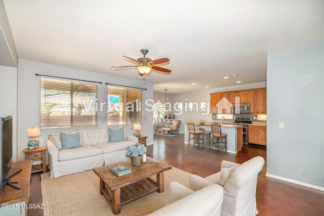 1419 W Red Creek Dr, Tucson, AZ 85737 - living room featuring ceiling fan and recessed lighting