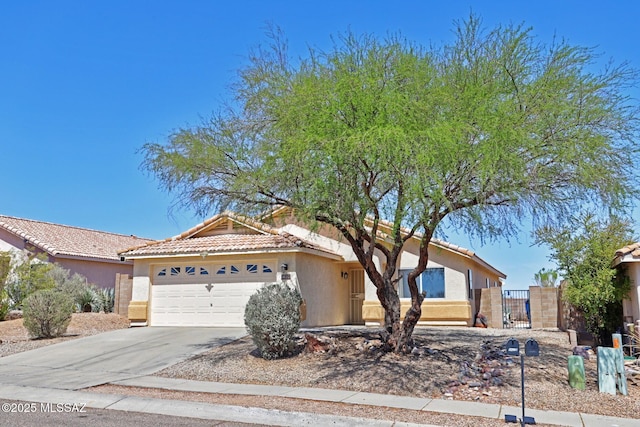 3625 N Avenida Albor, Tucson, AZ 85745 - ranch-style house with stucco siding, a garage, a tiled roof, and driveway