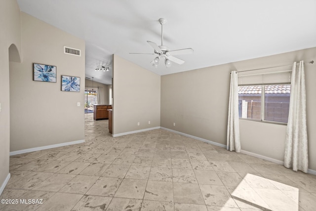 3625 N Avenida Albor, Tucson, AZ 85745 - empty room with ceiling fan, lofted ceiling, arched walkways, and baseboards