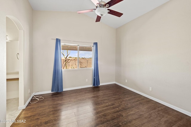 3625 N Avenida Albor, Tucson, AZ 85745 - spare room with arched walkways, a ceiling fan, vaulted ceiling, wood finished floors, and baseboards