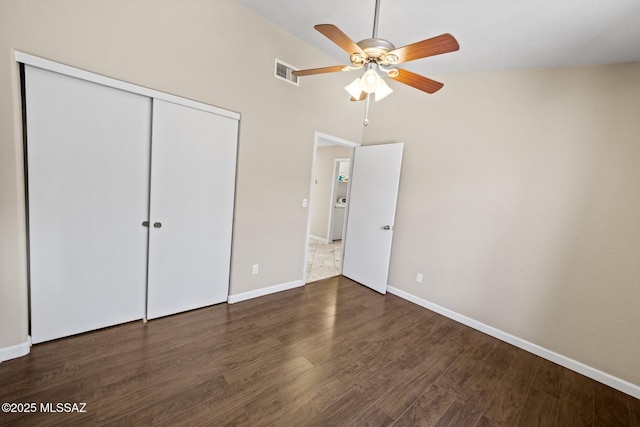 3625 N Avenida Albor, Tucson, AZ 85745 - unfurnished bedroom featuring a closet, wood finished floors, baseboards, and a ceiling fan