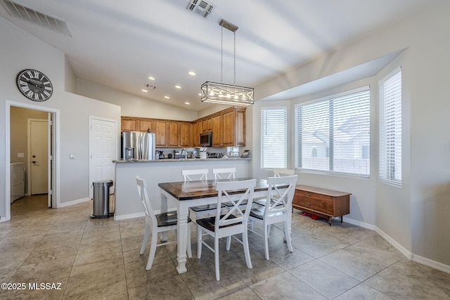 dining space featuring recessed lighting, baseboards, visible vents, and lofted ceiling