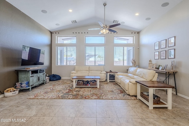 living room with plenty of natural light, a ceiling fan, and visible vents