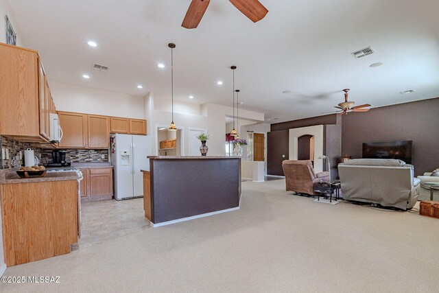 kitchen featuring ceiling fan, white appliances, and visible vents