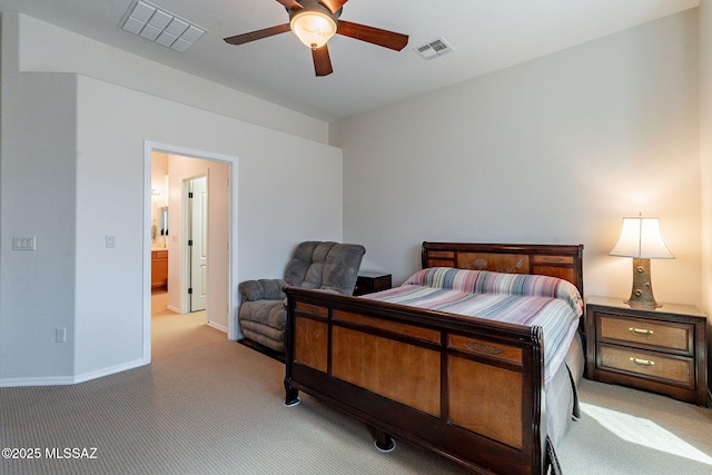 carpeted bedroom with visible vents, baseboards, and a ceiling fan
