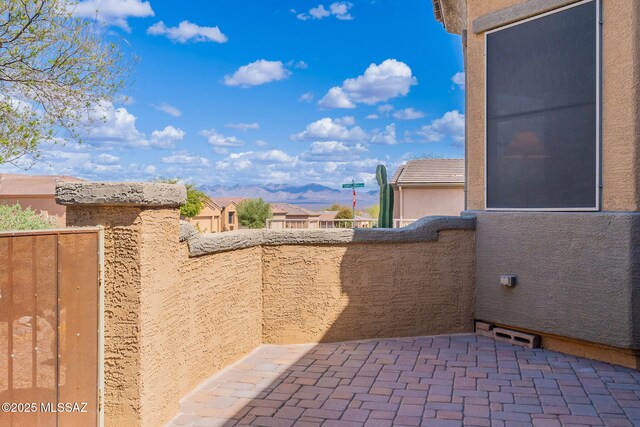 view of patio / terrace featuring a balcony