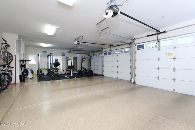 garage featuring a garage door opener