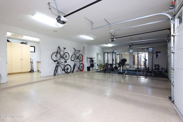 garage featuring a garage door opener