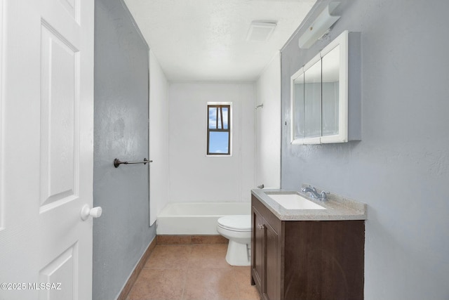 bathroom with vanity, shower / tub combination, toilet, tile patterned floors, and baseboards