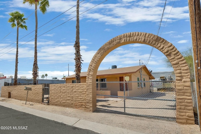 view of front of house featuring a gate and a fenced front yard