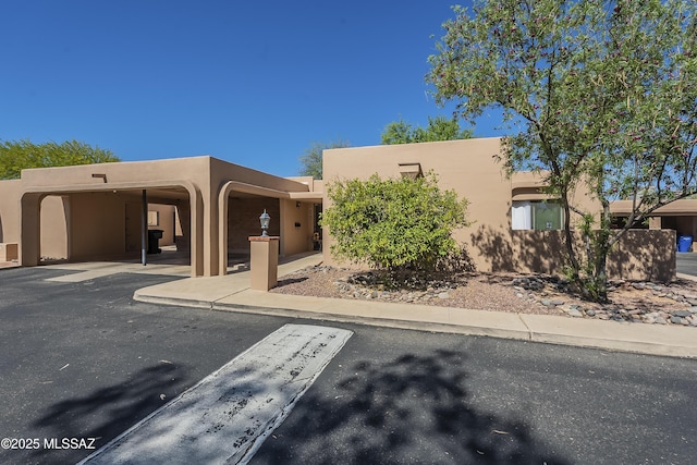 adobe home with stucco siding