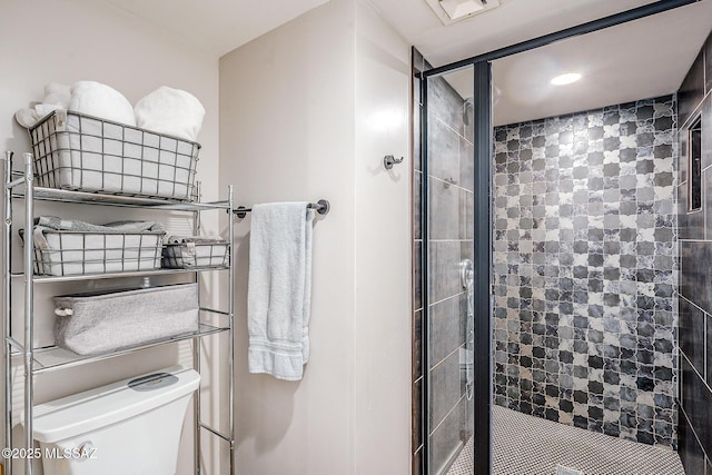 6120 E 5th St Unit B121, Tucson, AZ 85711 - bathroom featuring a stall shower and toilet