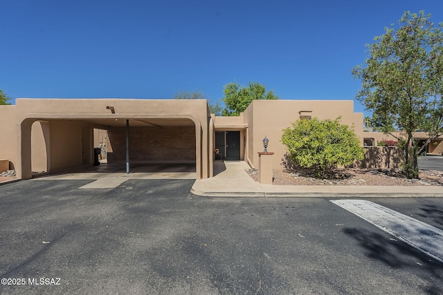 6120 E 5th St Unit B121, Tucson, AZ 85711 - adobe home with stucco siding