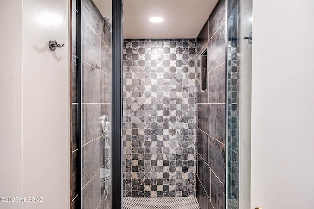 full bath with a shower stall and recessed lighting