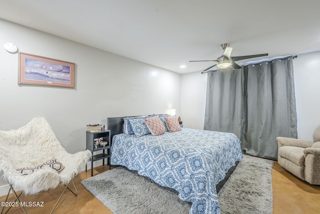 6120 E 5th St Unit B121, Tucson, AZ 85711 - bedroom featuring a ceiling fan and recessed lighting