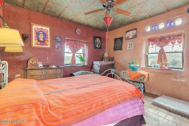 bedroom featuring an ornate ceiling