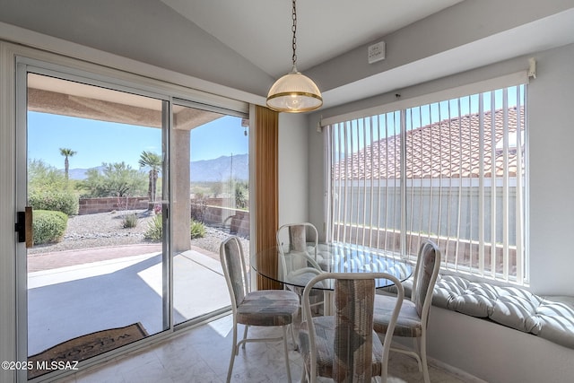 14180 N Trade Winds Way, Oro Valley, AZ 85755 - dining area with a mountain view and vaulted ceiling