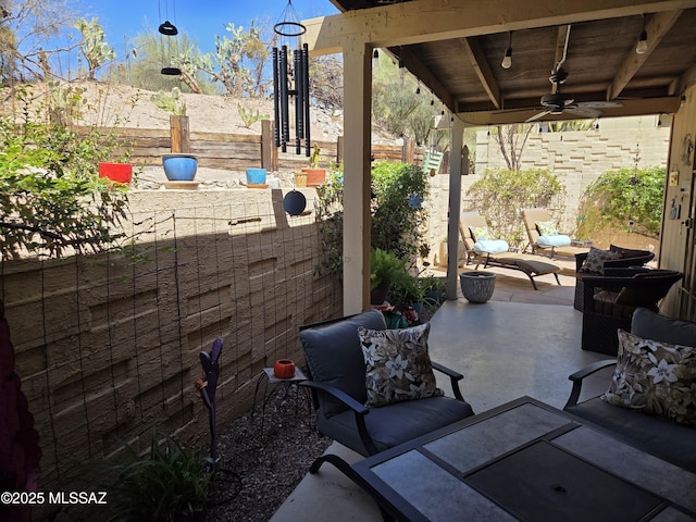 view of patio / terrace featuring a ceiling fan