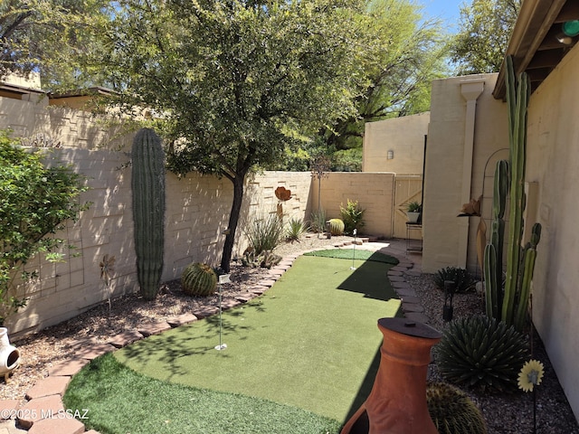 view of yard with a fenced backyard