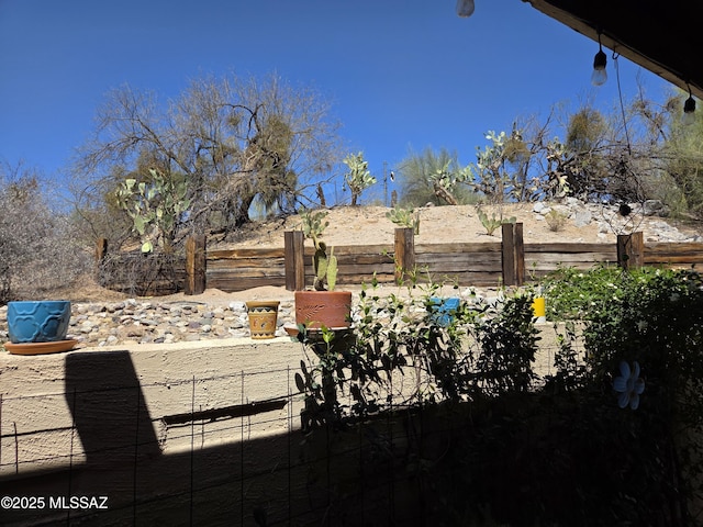 view of yard featuring fence