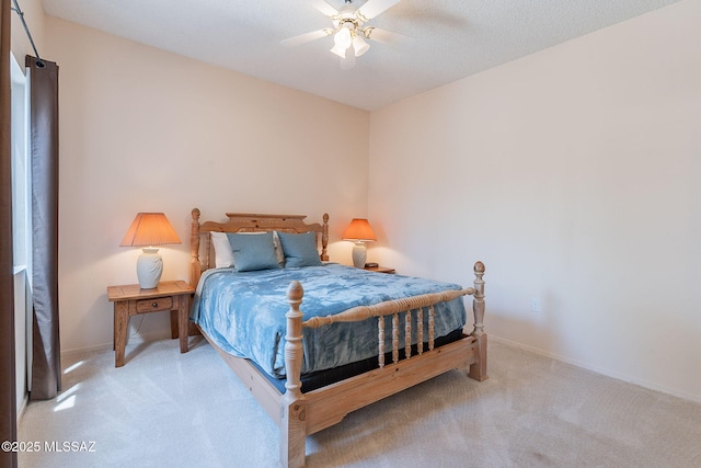3055 S Placita De La Picaza, Green Valley, AZ 85622 - carpeted bedroom with ceiling fan and baseboards