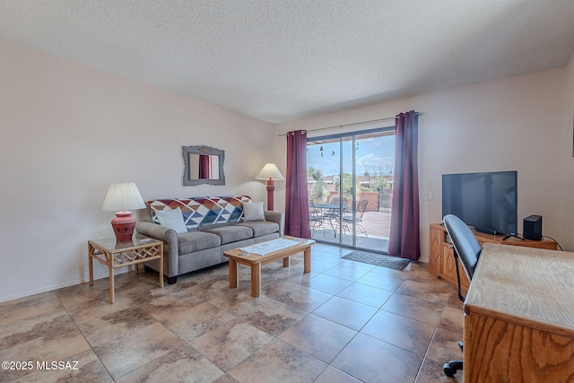 3055 S Placita De La Picaza, Green Valley, AZ 85622 - living room featuring a textured ceiling