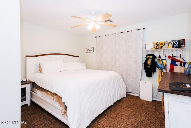 carpeted bedroom with ceiling fan and visible vents