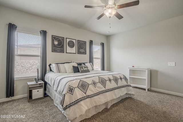1117 W Valley Meadow Ln, Sahuarita, AZ 85629 - bedroom with carpet floors, baseboards, and ceiling fan