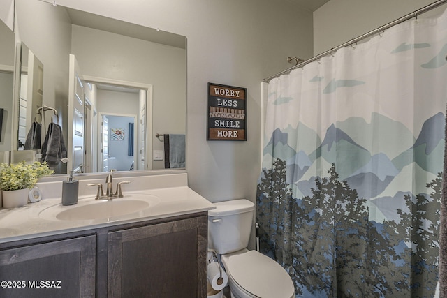 1117 W Valley Meadow Ln, Sahuarita, AZ 85629 - bathroom featuring vanity, toilet, and a shower with curtain