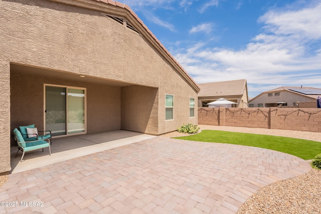 1117 W Valley Meadow Ln, Sahuarita, AZ 85629 - view of patio / terrace with a fenced backyard