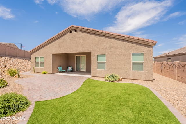 1117 W Valley Meadow Ln, Sahuarita, AZ 85629 - rear view of house featuring a patio and stucco siding
