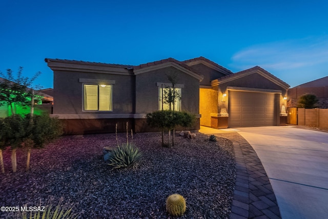 1117 W Valley Meadow Ln, Sahuarita, AZ 85629 - single story home featuring driveway, a garage, stucco siding, a tile roof, and fence