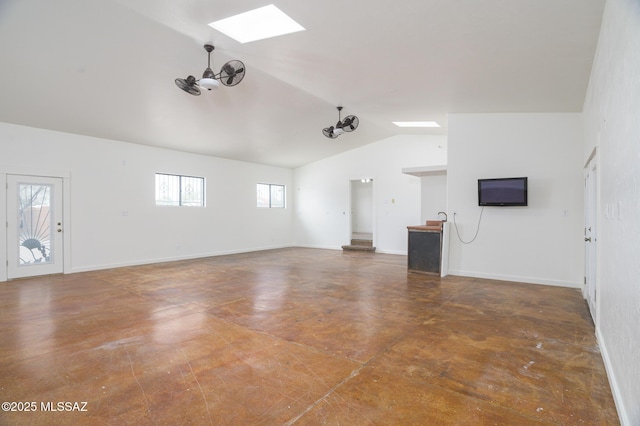 3737 E Pima St, Tucson, AZ 85716 - unfurnished living room featuring concrete floors, baseboards, and lofted ceiling with skylight