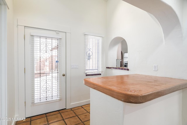 3737 E Pima St, Tucson, AZ 85716 - interior space with arched walkways and tile patterned flooring