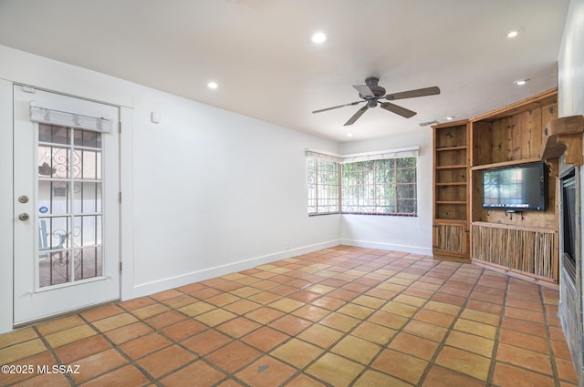 3737 E Pima St, Tucson, AZ 85716 - unfurnished living room featuring baseboards, a ceiling fan, tile patterned flooring, and recessed lighting