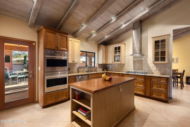 6341 E Brian Kent St, Tucson, AZ 85710 - kitchen with tasteful backsplash, lofted ceiling with beams, wall chimney range hood, appliances with stainless steel finishes, and a sink
