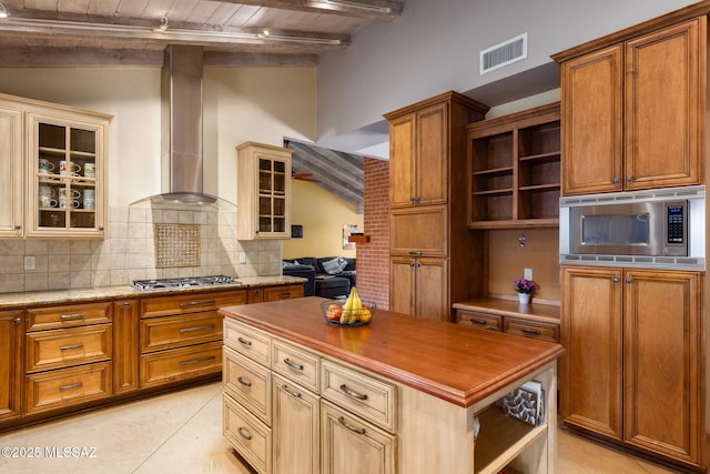 6341 E Brian Kent St, Tucson, AZ 85710 - kitchen with appliances with stainless steel finishes, open shelves, wood counters, and wall chimney exhaust hood