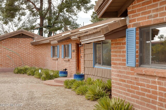 6341 E Brian Kent St, Tucson, AZ 85710 - view of side of property with brick siding