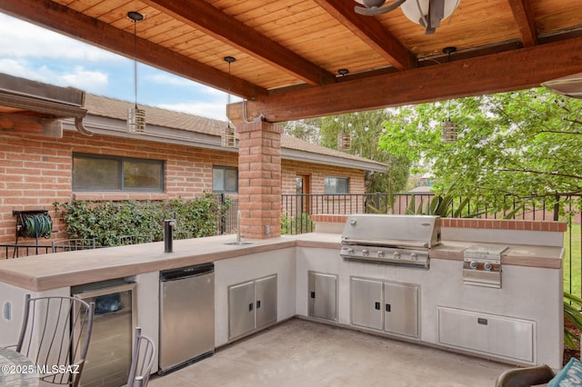 6341 E Brian Kent St, Tucson, AZ 85710 - view of patio / terrace with wine cooler, a grill, and area for grilling