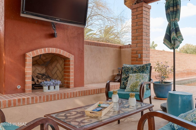 6341 E Brian Kent St, Tucson, AZ 85710 - view of patio with an outdoor brick fireplace and fence
