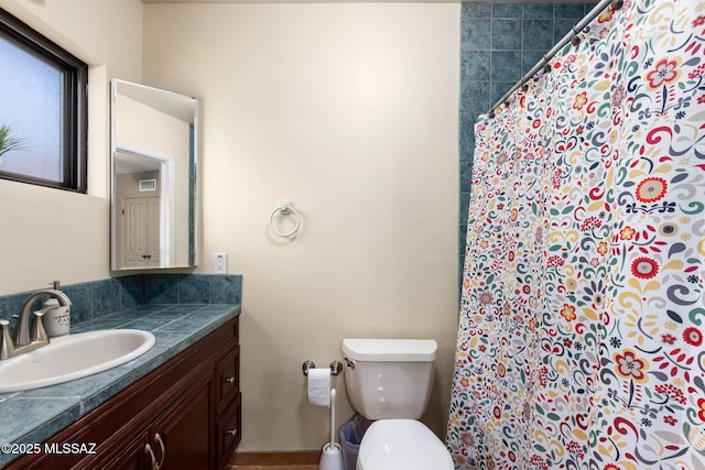 6341 E Brian Kent St, Tucson, AZ 85710 - full bath with curtained shower, vanity, and toilet
