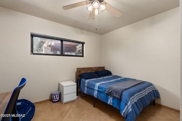 6341 E Brian Kent St, Tucson, AZ 85710 - bedroom with ceiling fan and baseboards