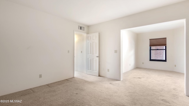 unfurnished office featuring built in desk, light wood-type flooring, baseboards, and ceiling fan
