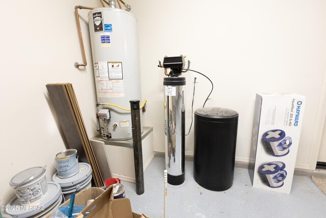 utility room featuring gas water heater