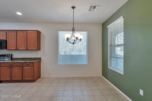 full bath featuring tile patterned flooring, baseboards, a sink, and double vanity